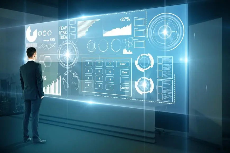 Man stands in front of a digital screen and looks at SEO statistics